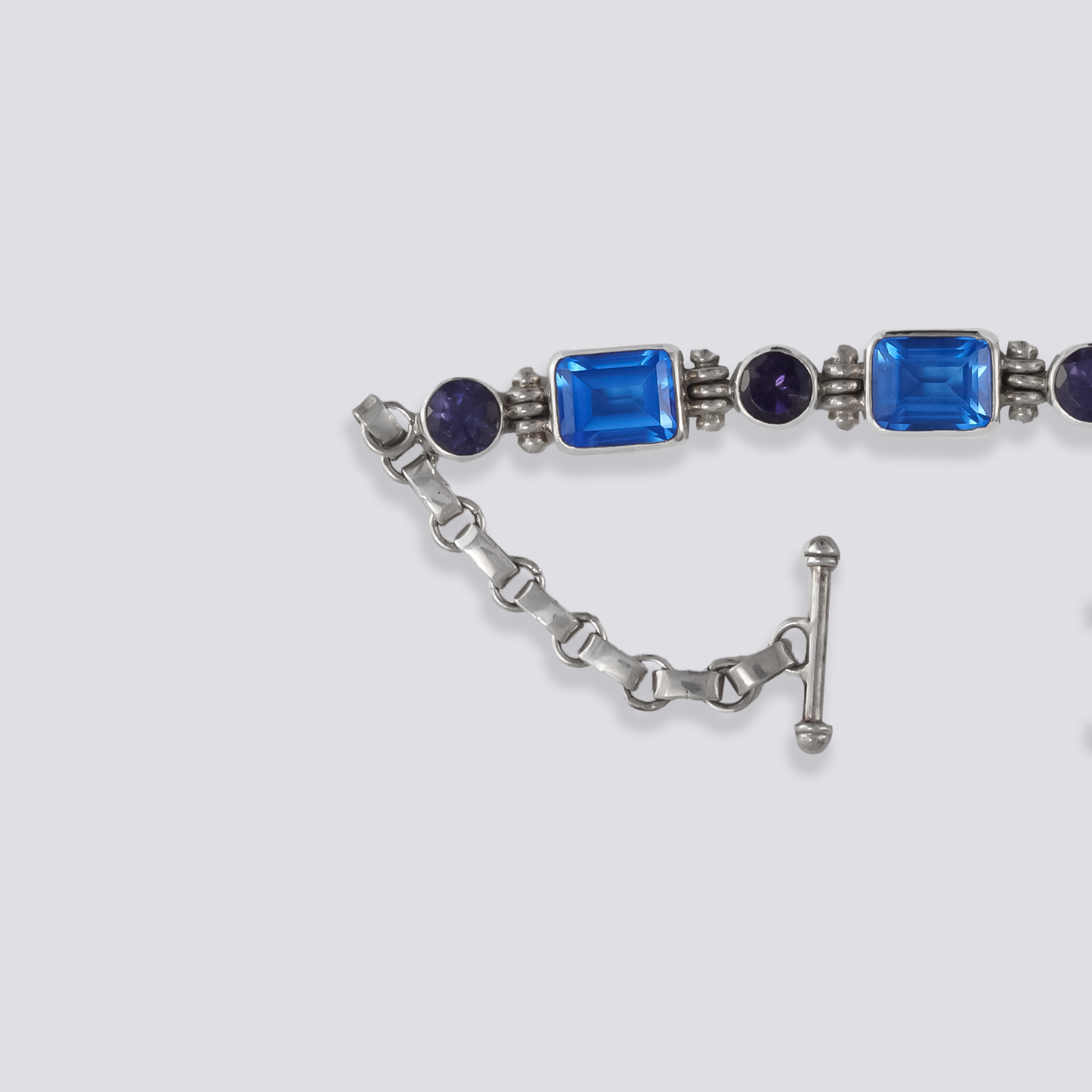 Sterling silver bracelet with square blue siberian quartz And purple topaz