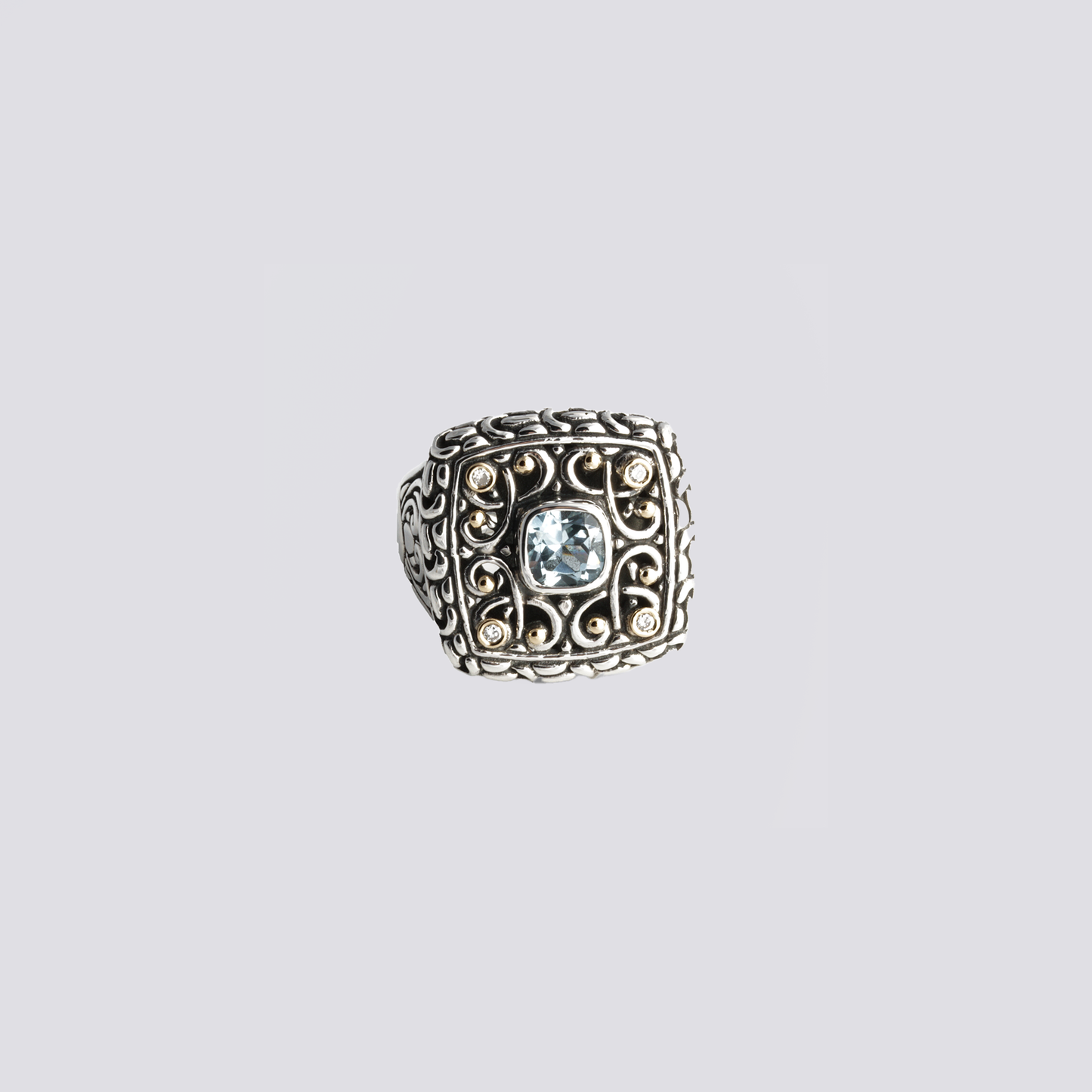 Sterling silver ring with blue topaz and diamonds