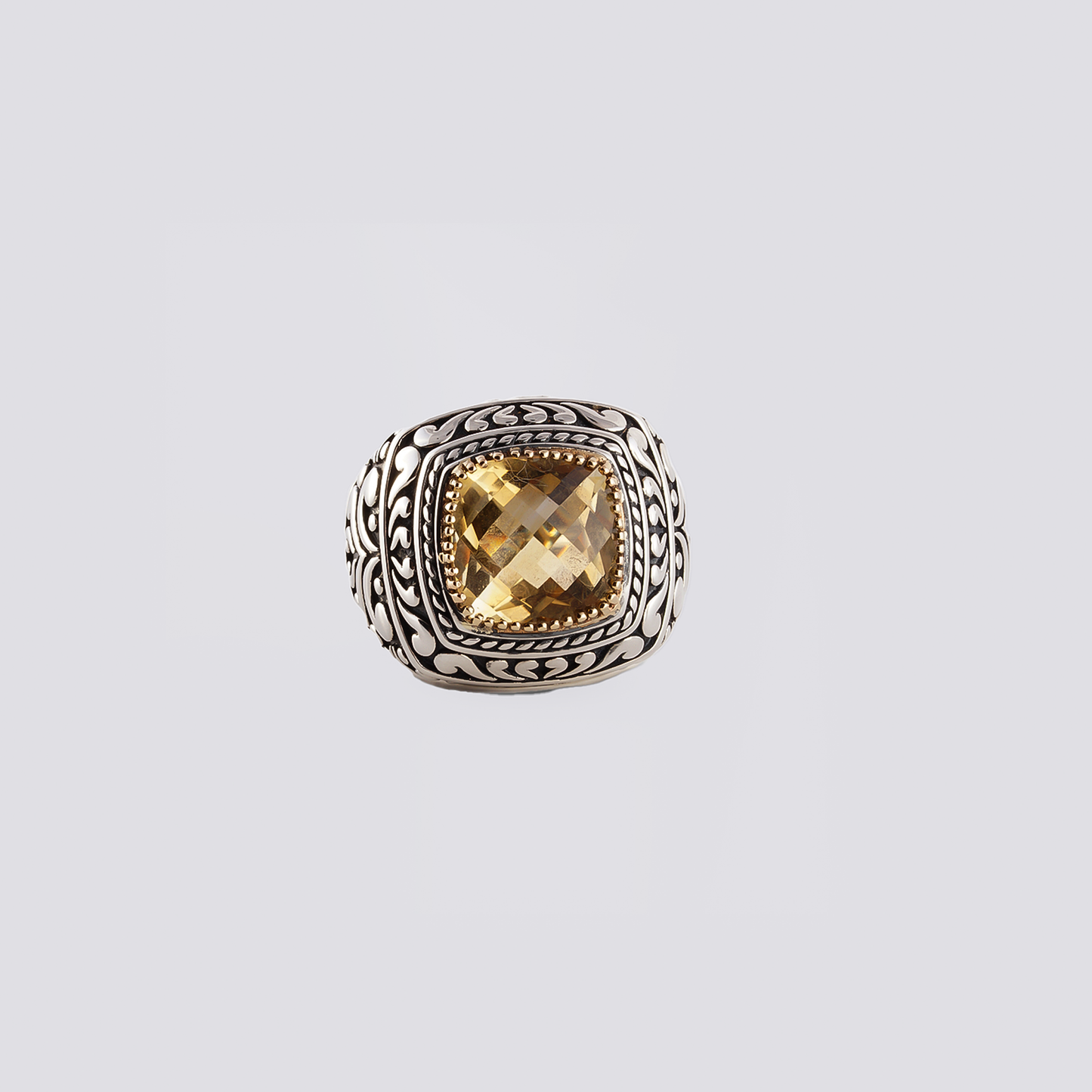 Sterling silver ring with yellow citrine stone and artisan design