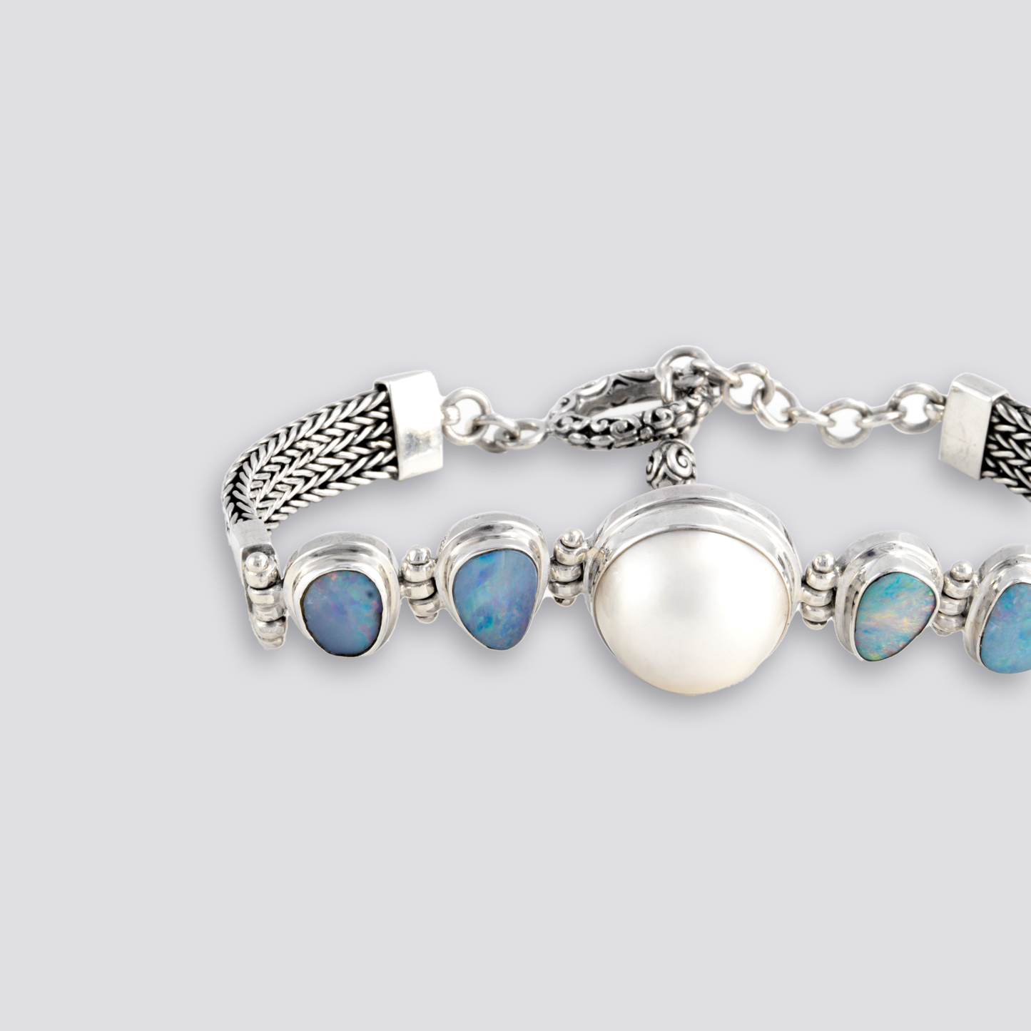 Sterling silver bracelet with white pearl and opal stones