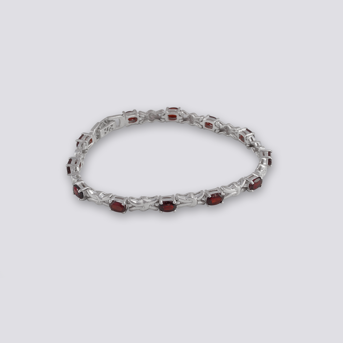 Sterling silver bracelet with red garnet