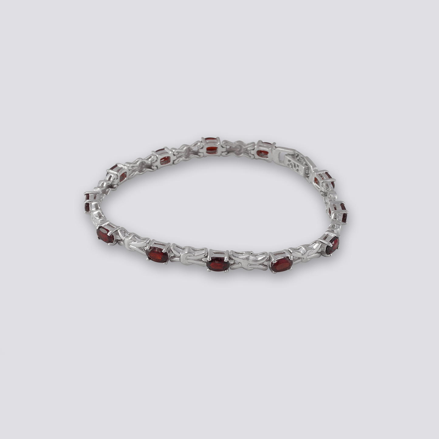 Sterling silver bracelet with red garnet
