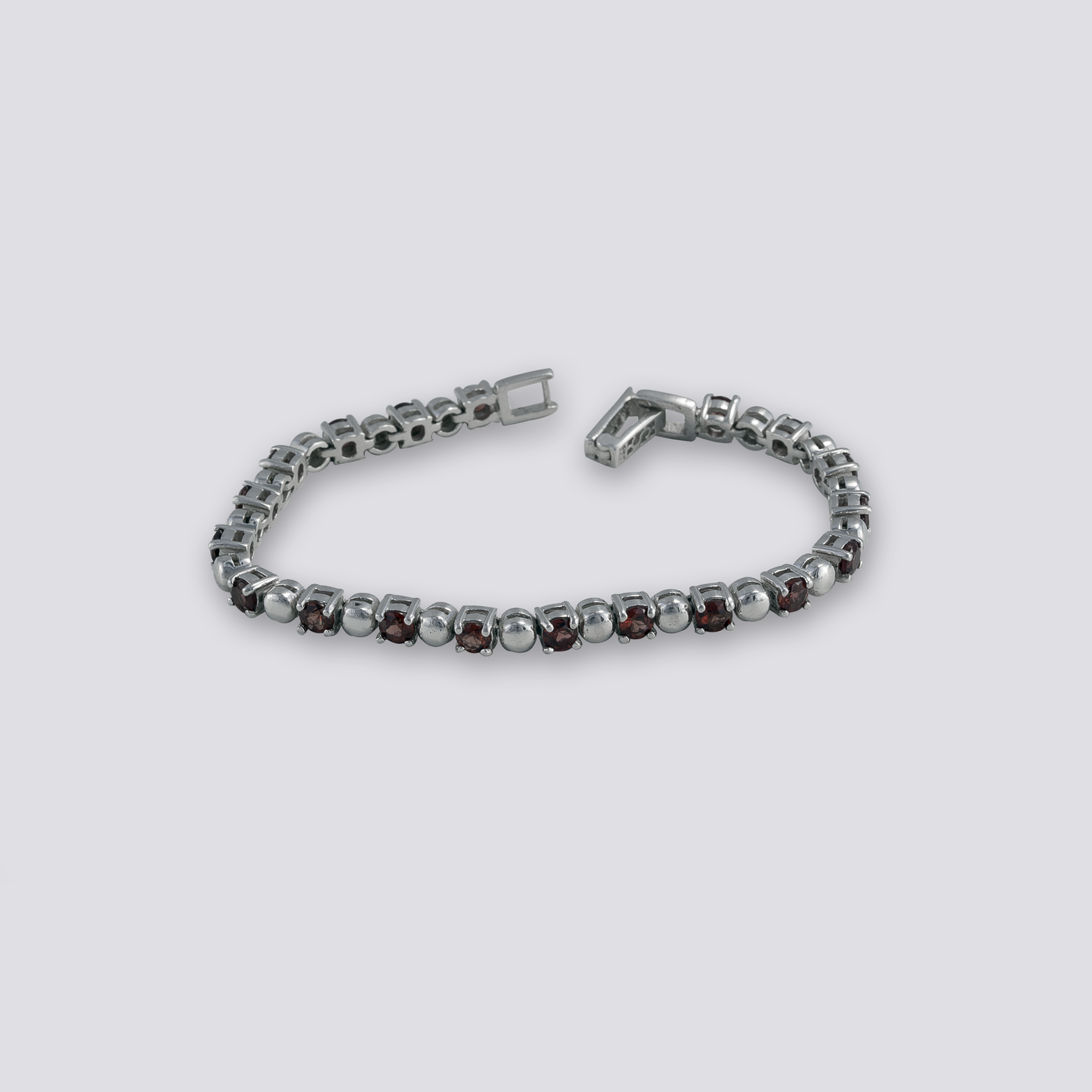 Sterling silver bracelet with red garnet