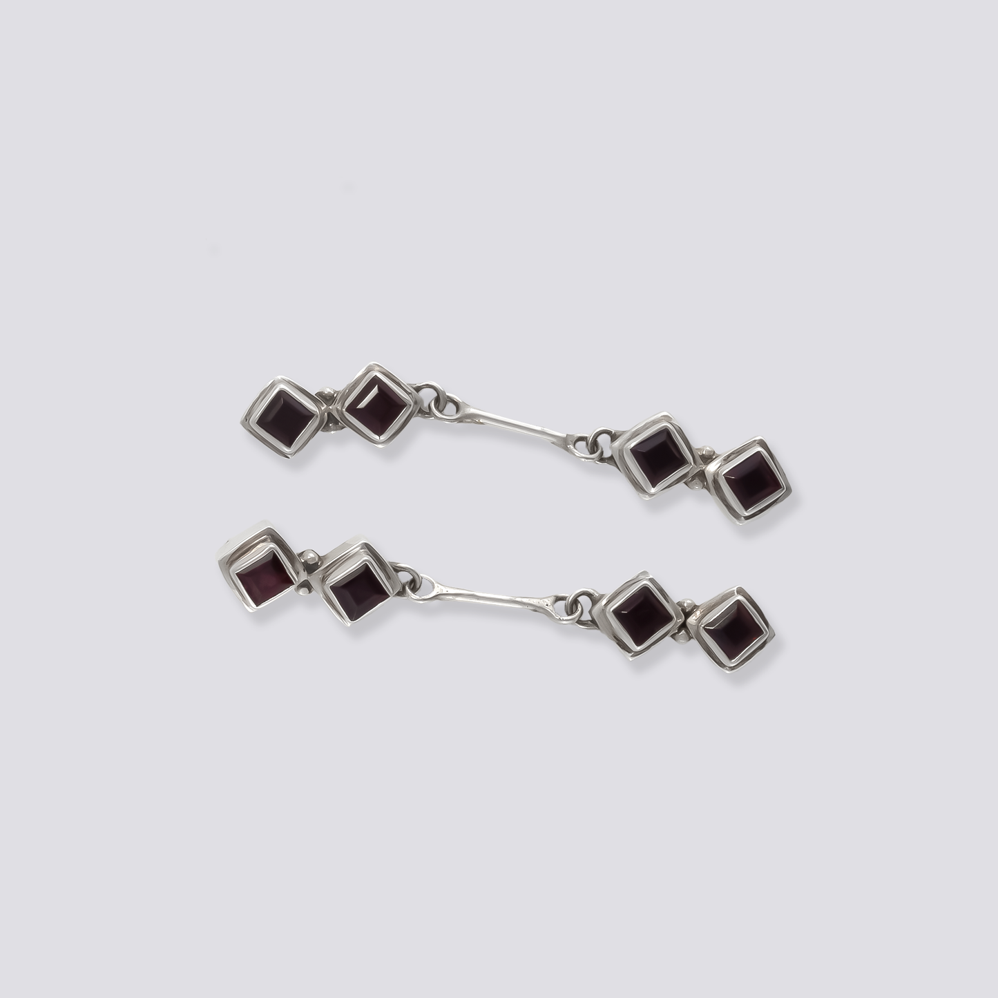 Sterling silver earrings with red garnet