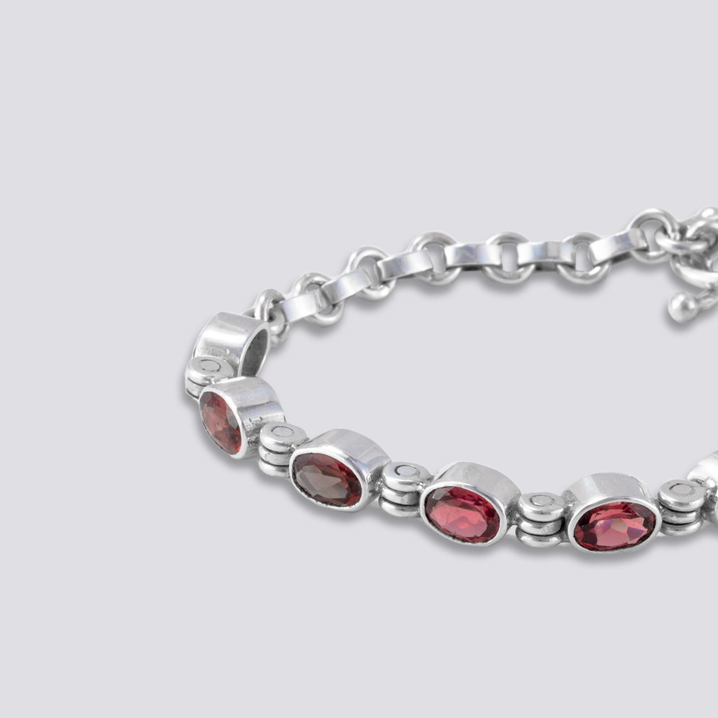 Sterling silver bracelet with red garnet