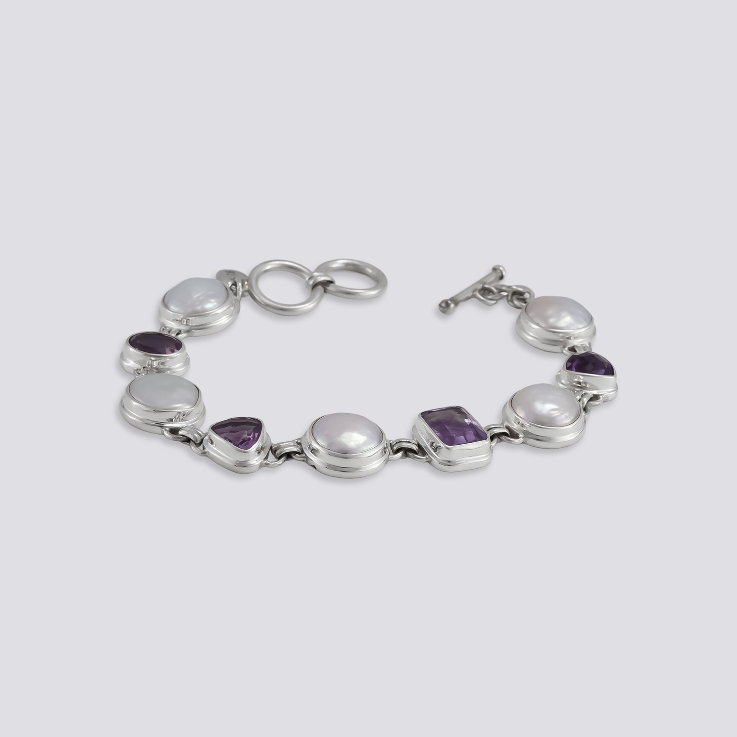 Sterling silver bracelet with amethyst and pearl