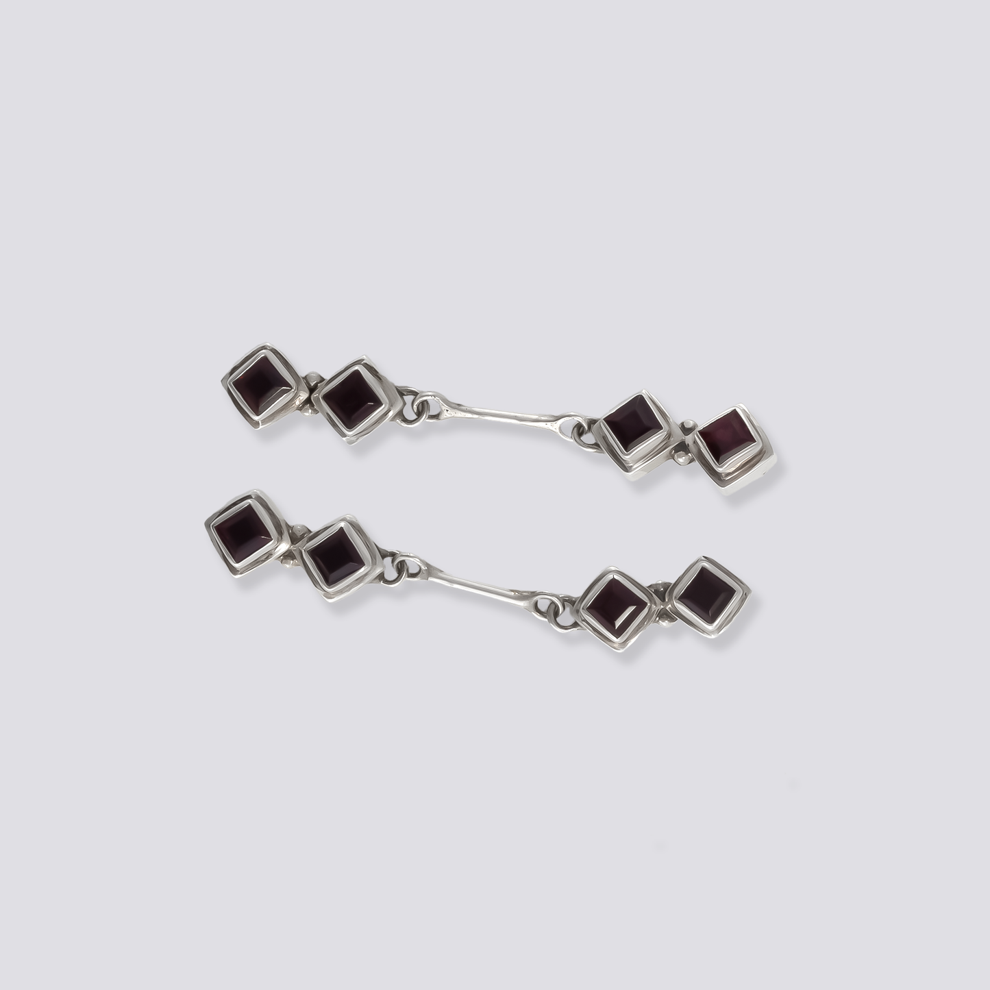 Sterling silver earrings with red garnet