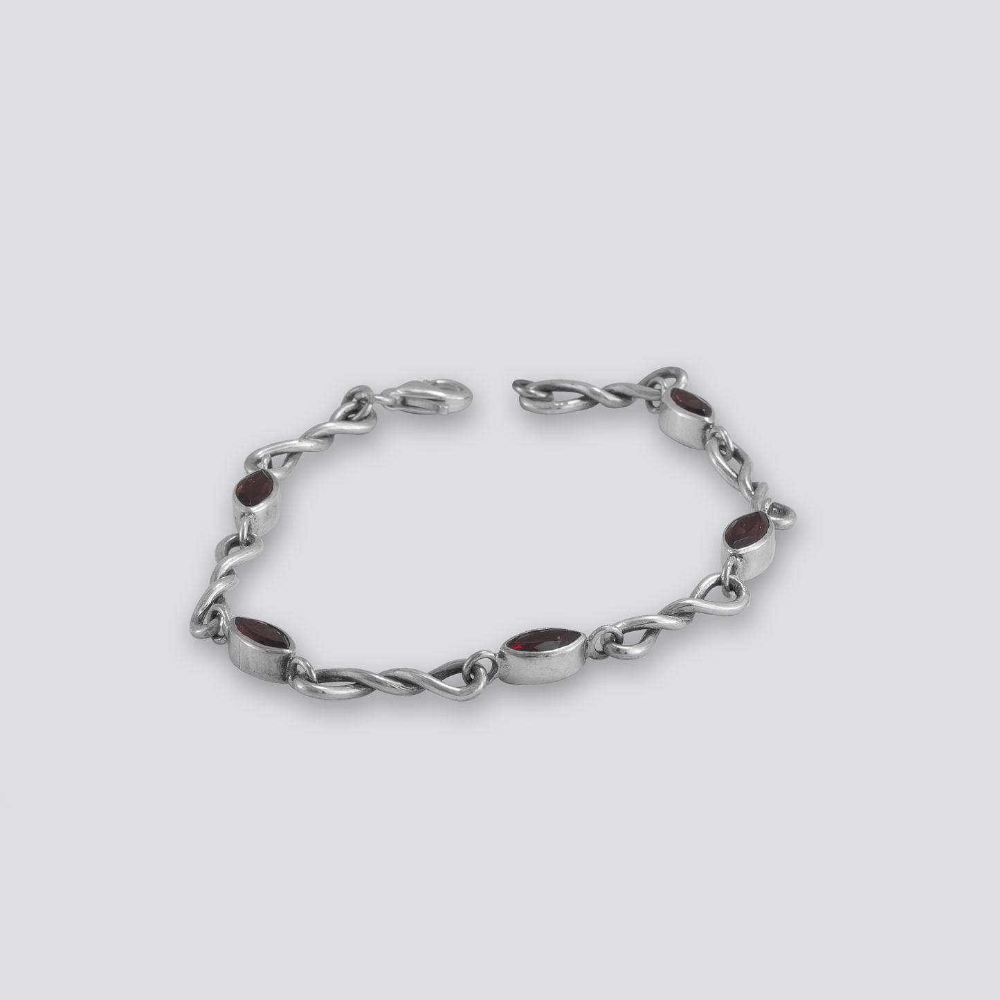 Sterling silver bracelet with red garnet