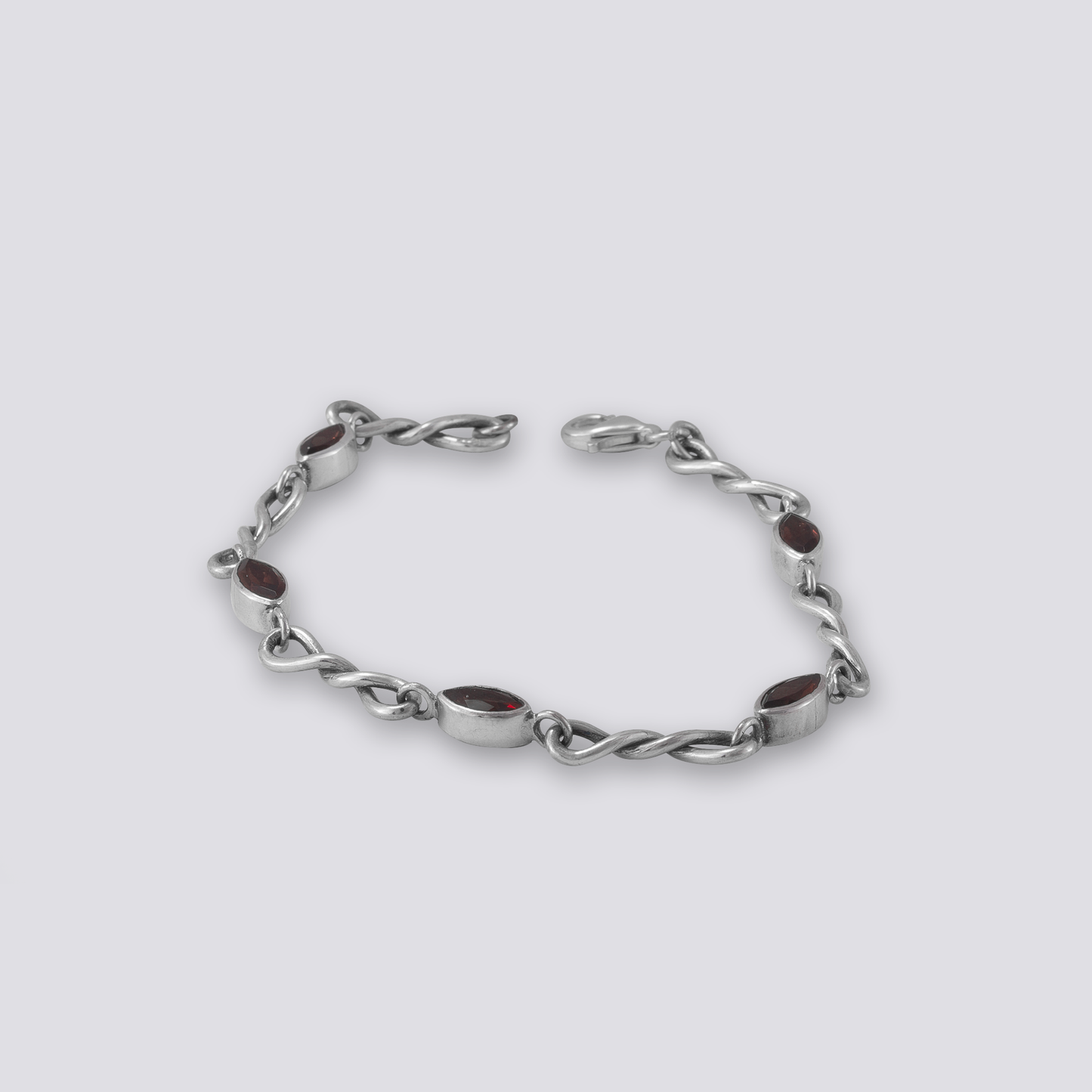 Sterling silver bracelet with red garnet