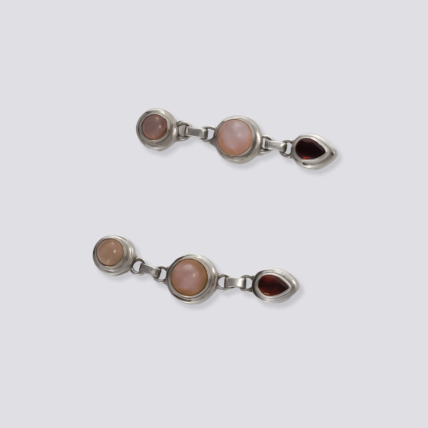 Sterling silver earrings with red garnet and white stones