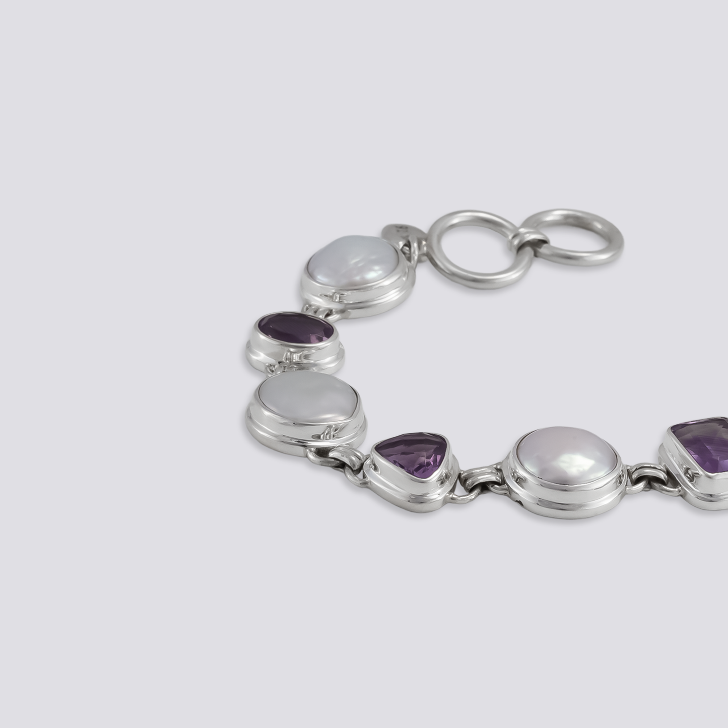 Sterling silver bracelet with amethyst and pearl