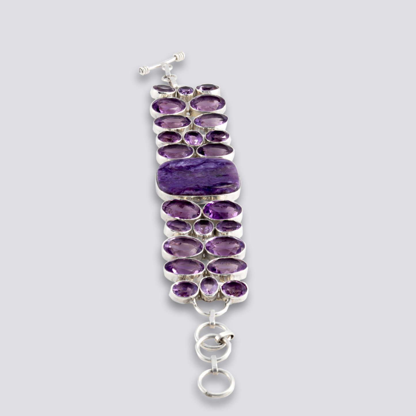 Sterling silver bracelet with purple stone