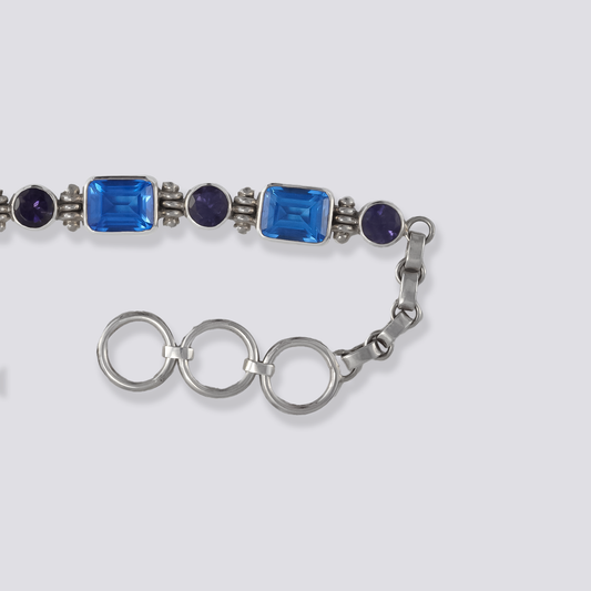 Sterling silver bracelet with square blue siberian quartz And purple topaz