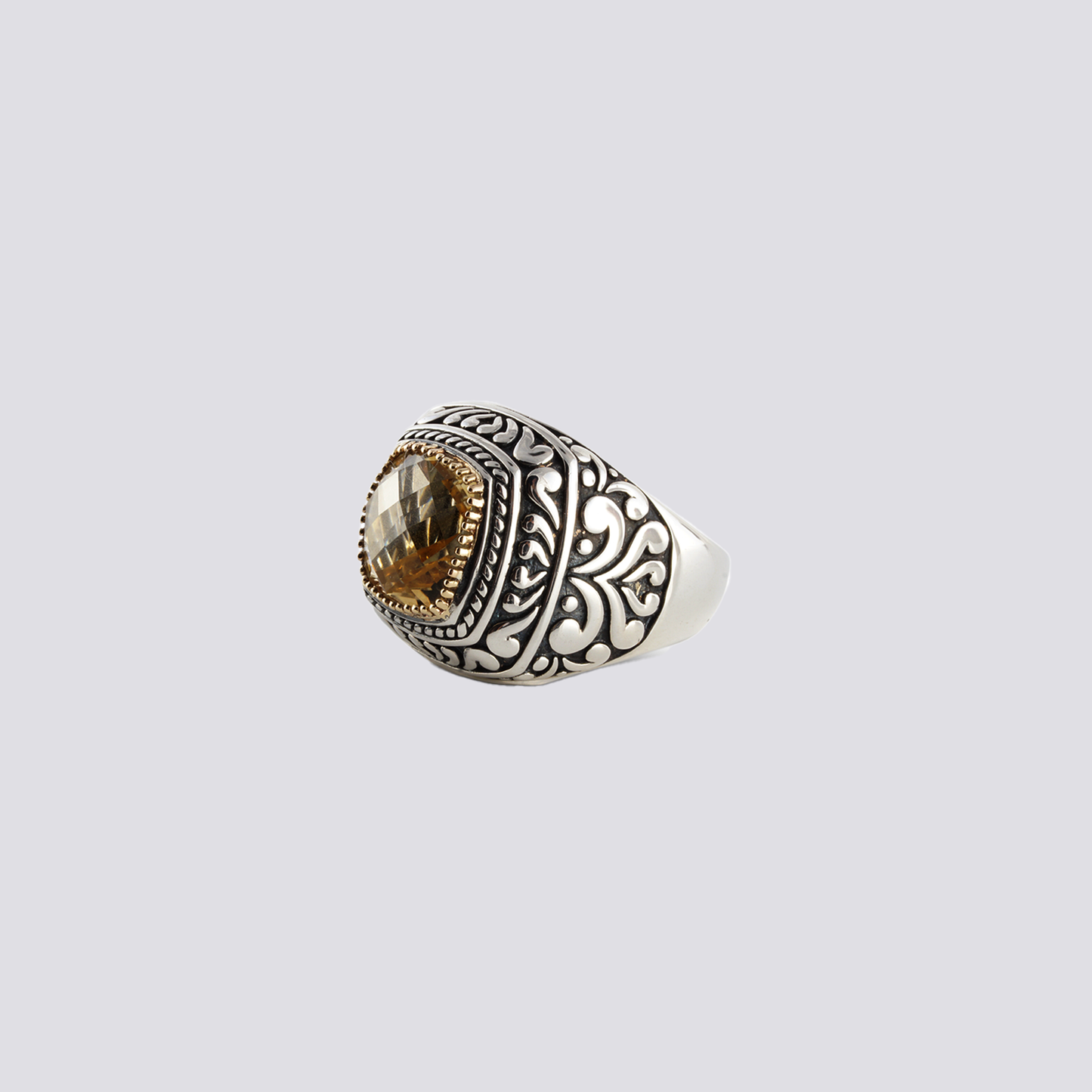 Sterling silver ring with yellow citrine stone and artisan design
