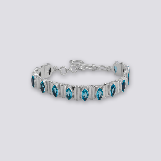 Sterling silver bracelet with blue topaz