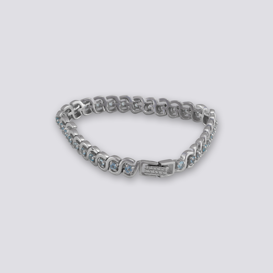 Sterling silver bracelet with blue topaz