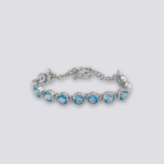 Sterling silver bracelet with blue topaz