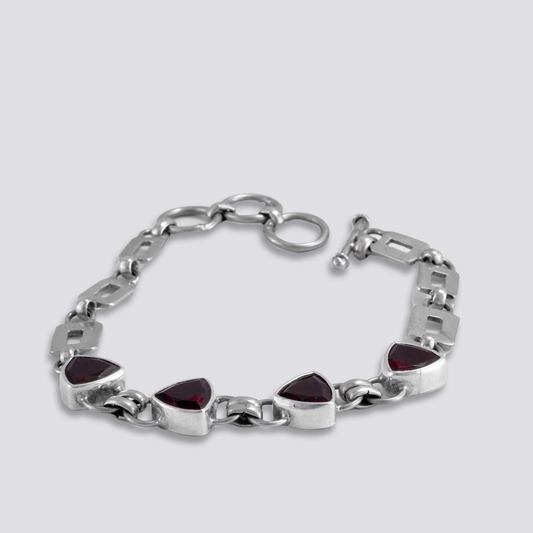 Sterling silver bracelet with red garnet