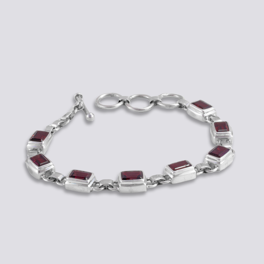 Sterling silver bracelet with red garnet