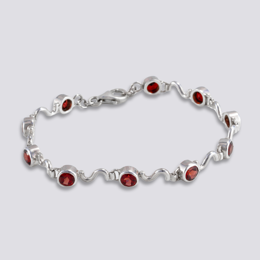 Sterling silver bracelet with red garnet