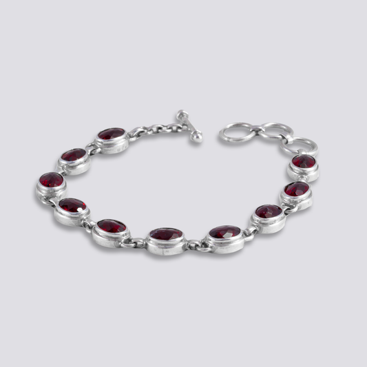 Sterling silver bracelet with red garnet