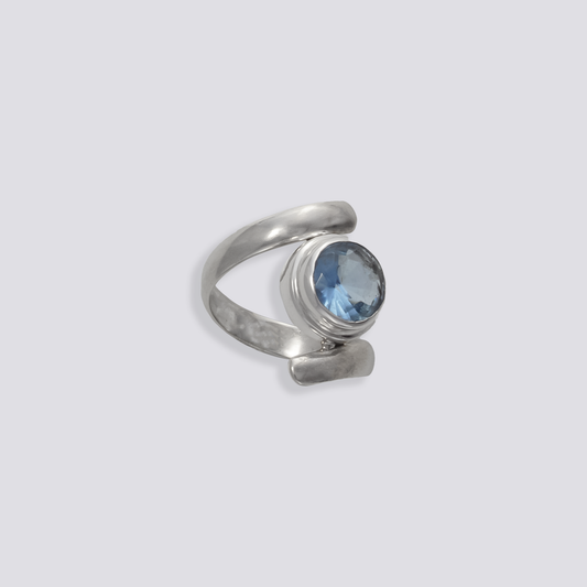 Sterling silver ring with blue topaz stone