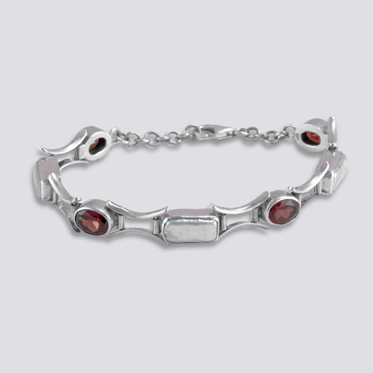 Sterling silver bracelet with red garnet and pearl