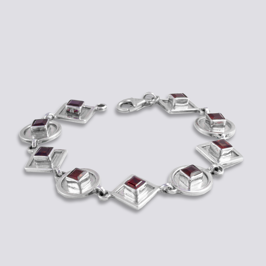 Sterling silver bracelet with red garnet