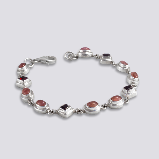Sterling silver bracelet with red garnet