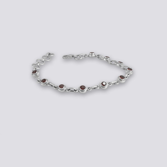 Sterling silver bracelet with red garnet