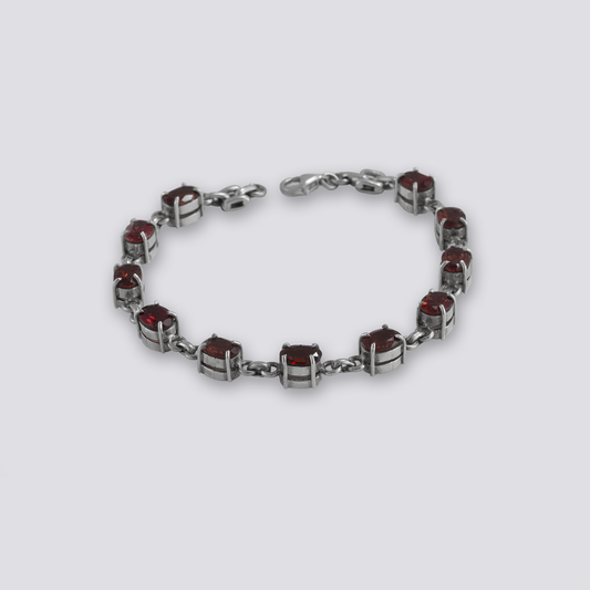 Sterling silver bracelet with red garnet