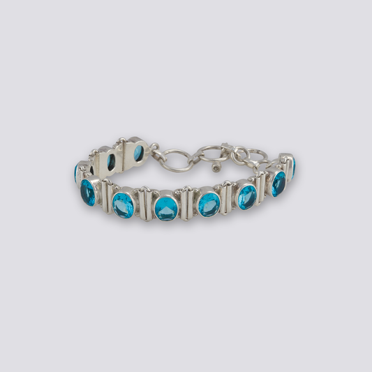 Sterling silver bracelet with blue topaz