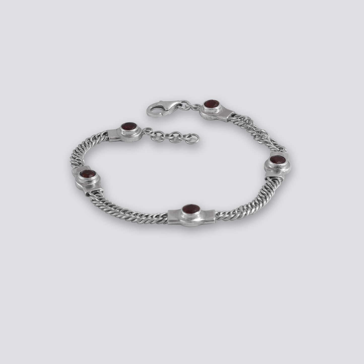Sterling silver bracelet with red garnet