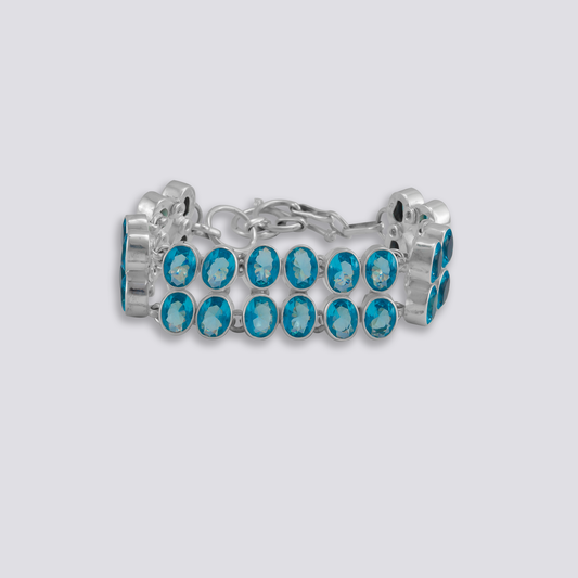 Sterling silver bracelet with blue topaz
