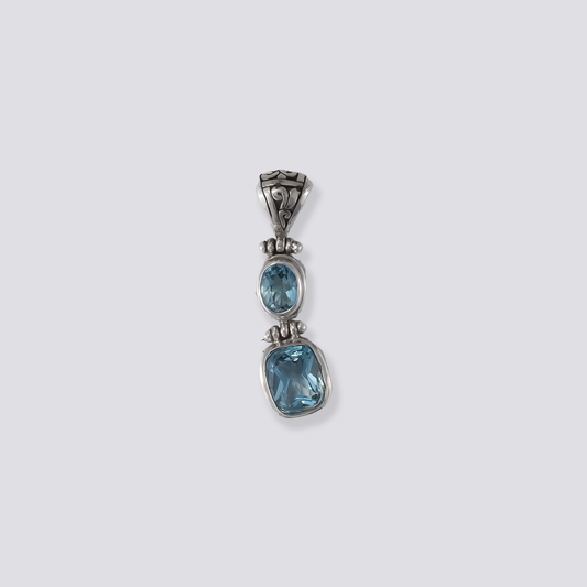 Sterling silver pendant with blue topaz stone