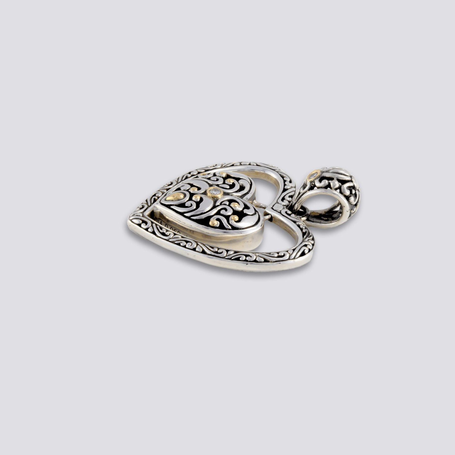 Sterling sliver heart pendant with diamond and 18k gold