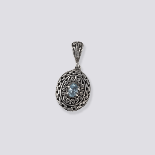 Sterling silver pendant with blue topaz stone
