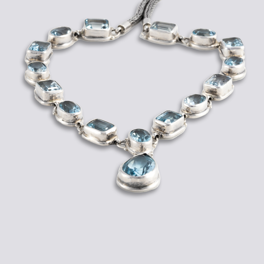 Sterling silver necklace with blue topaz