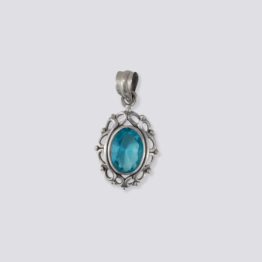 Sterling silver pendant with blue topaz stone