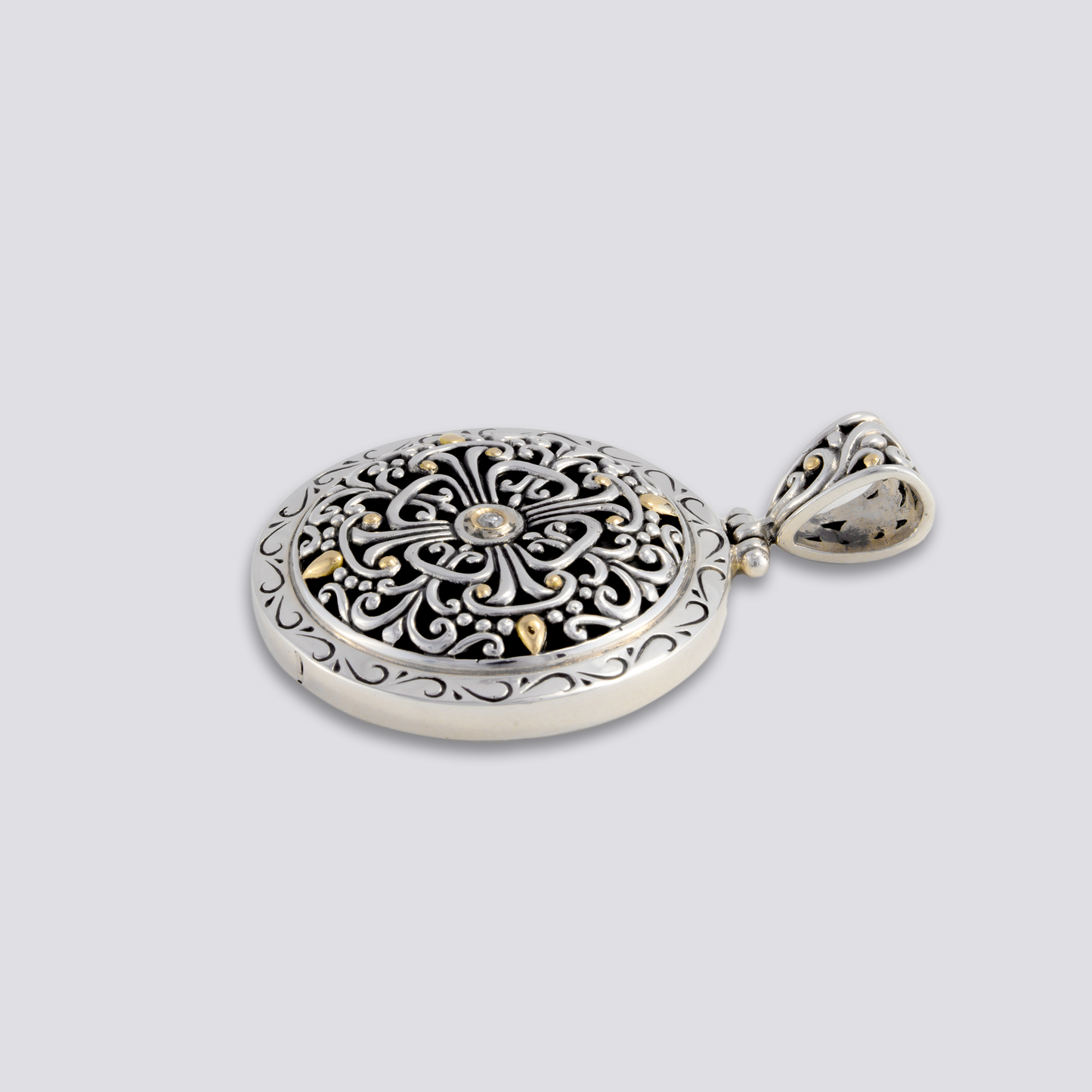 Sterling sliver pendant with diamond and 18k gold