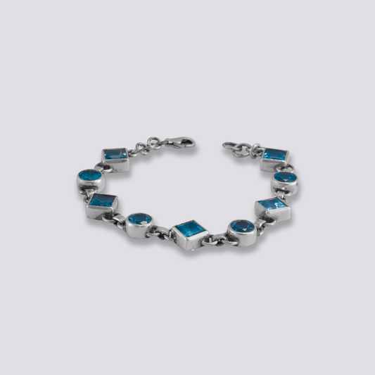 Sterling silver bracelet with blue topaz