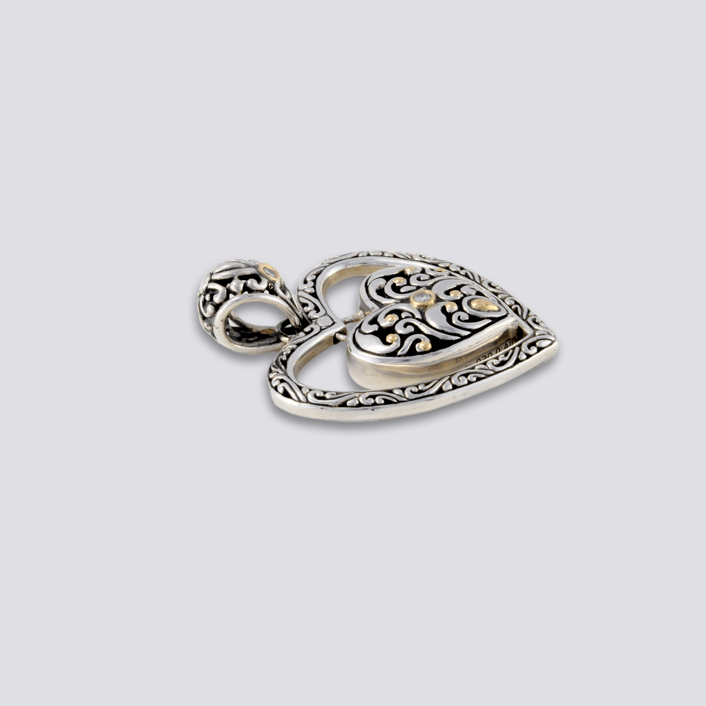 Sterling sliver heart pendant with diamond and 18k gold