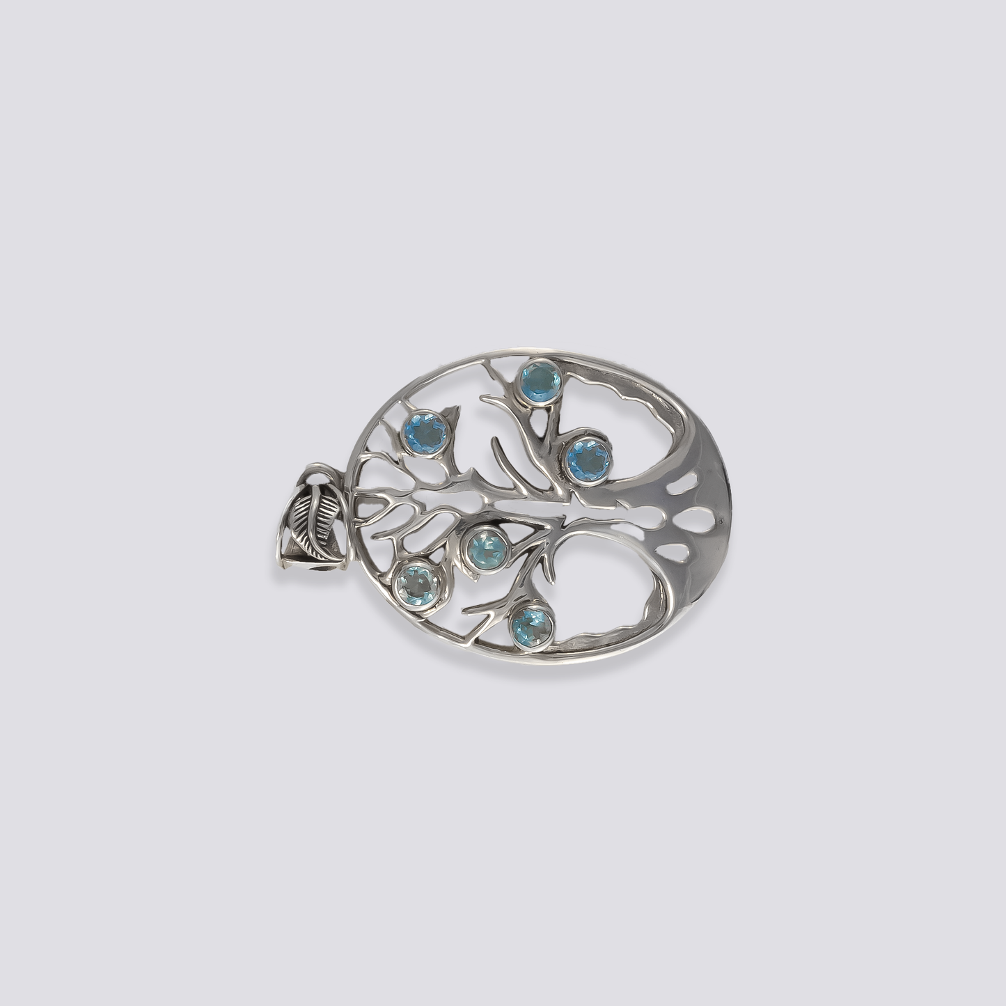 Sterling silver pendant with blue topaz stone
