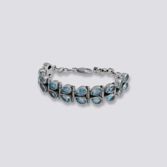 Sterling silver bracelet with blue topaz