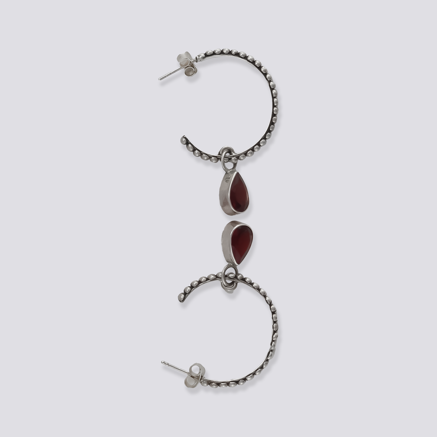 Sterling silver earrings with red garnet