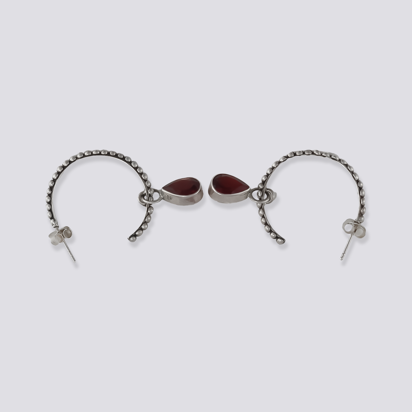Sterling silver earrings with red garnet