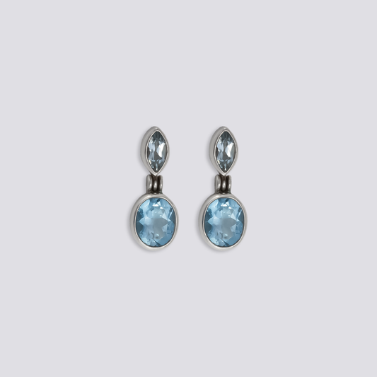 Sterling silver earrings with blue topaz stones