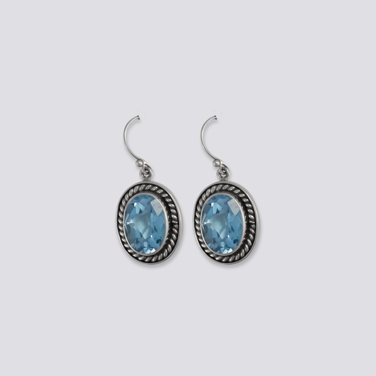Sterling silver earrings with blue topaz stones