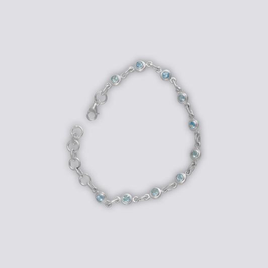 Sterling silver bracelet with blue topaz