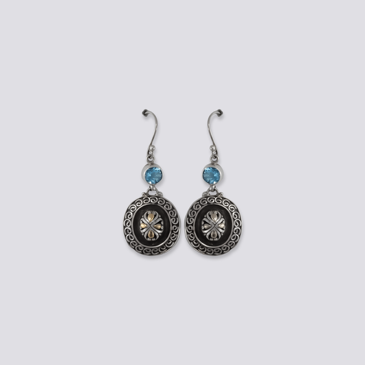 Sterling silver earrings with blue topaz stones